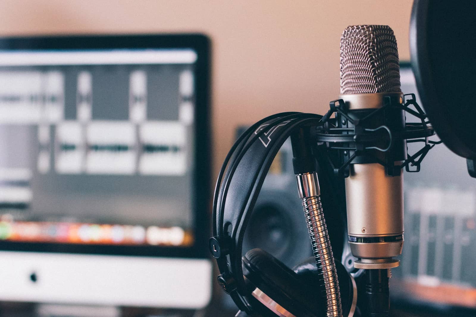 Editing suite with headphones and a microphone