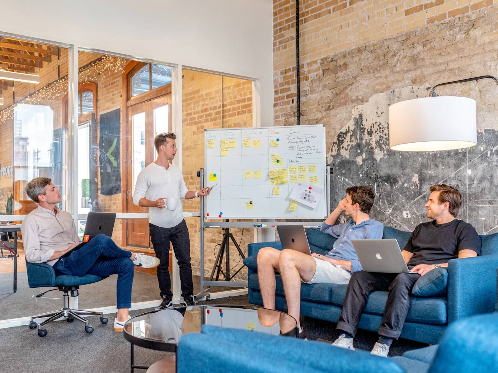 An agency team working together in an open office